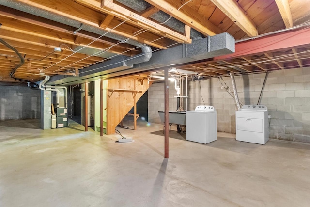 W173N8465 Robert Ave, Menomonee Falls, WI 53051 - unfinished below grade area with washer and dryer and heating unit