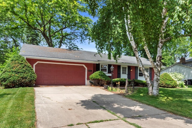 W173N8465 Robert Ave, Menomonee Falls, WI 53051 - ranch-style house featuring an attached garage, a front lawn, and concrete driveway