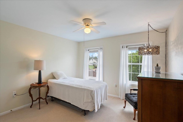 110985 Candlewood Ct, Marshfield, WI 54449 - bedroom with light carpet and a ceiling fan