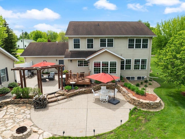 110985 Candlewood Ct, Marshfield, WI 54449 - rear view of house featuring a patio, a wooden deck, a gazebo, a yard, and outdoor dining space