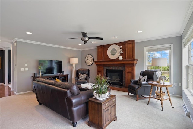 110985 Candlewood Ct, Marshfield, WI 54449 - living room with light colored carpet, ceiling fan, a large fireplace, recessed lighting, and crown molding