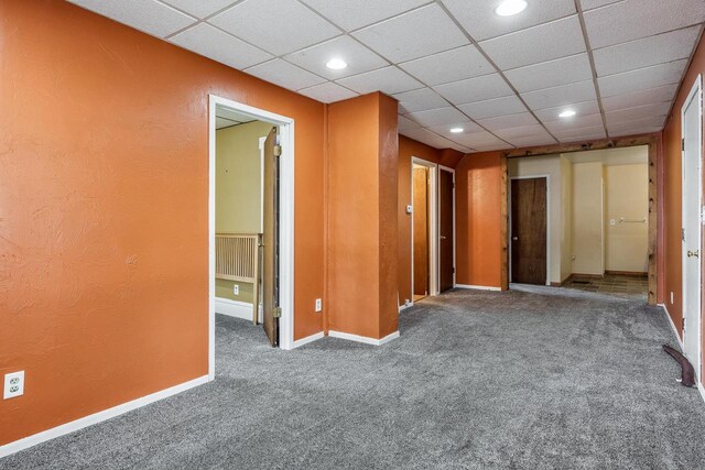 1015 Bluff St, Beloit, WI 53511 - carpeted empty room with recessed lighting and a drop ceiling