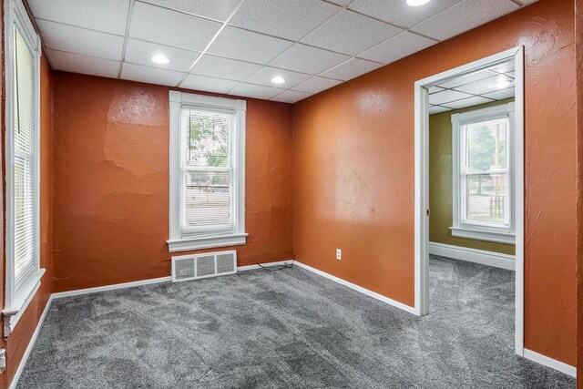 1015 Bluff St, Beloit, WI 53511 - carpeted spare room with healthy amount of natural light, a paneled ceiling, and recessed lighting