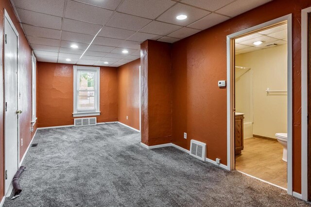 1015 Bluff St, Beloit, WI 53511 - carpeted empty room with a drop ceiling and recessed lighting