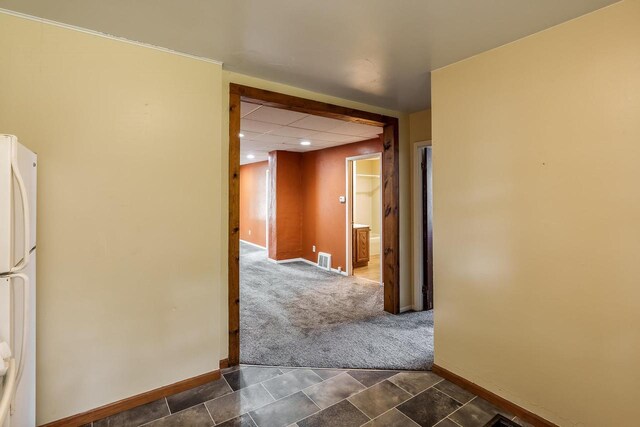 1015 Bluff St, Beloit, WI 53511 - hallway featuring dark colored carpet and recessed lighting