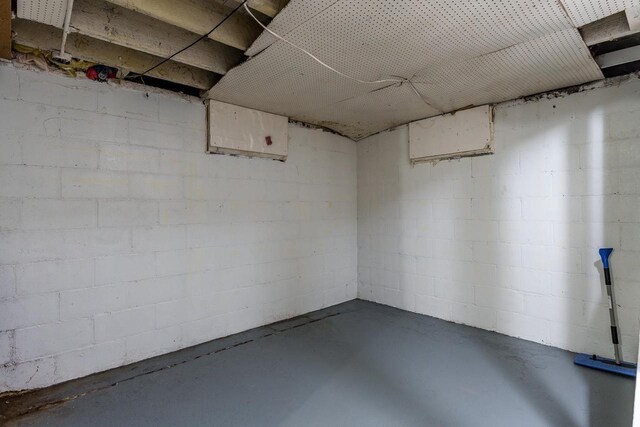 1015 Bluff St, Beloit, WI 53511 - unfinished basement featuring concrete block wall
