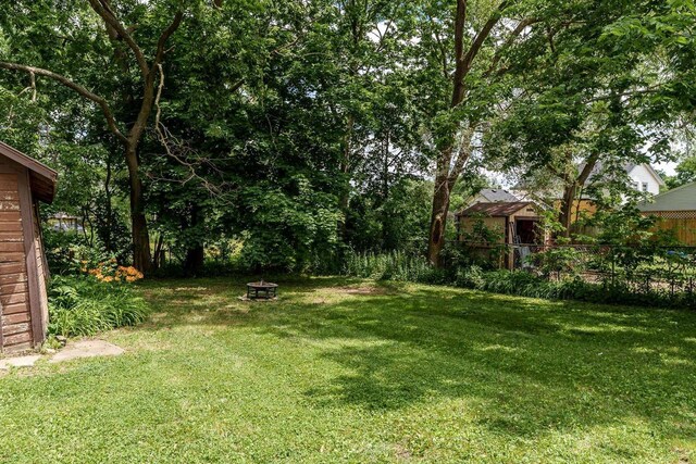 1015 Bluff St, Beloit, WI 53511 - view of yard with a fire pit