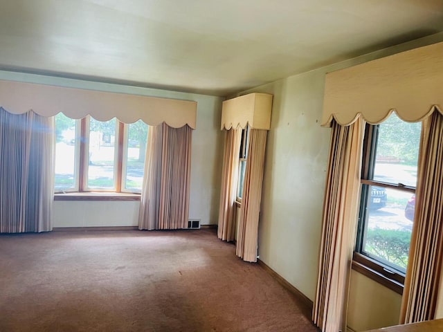 5734 N 80th St, Milwaukee, WI 53218 - unfurnished room with carpet floors and plenty of natural light