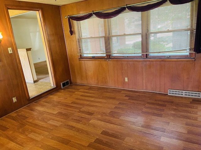 5734 N 80th St, Milwaukee, WI 53218 - unfurnished room with wood finished floors and wood walls