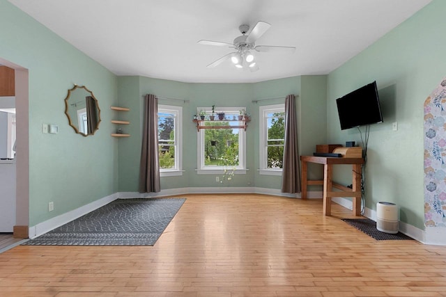 731 S Michigan St, De Pere, WI 54115 - unfurnished living room with hardwood / wood-style flooring, healthy amount of natural light, and ceiling fan