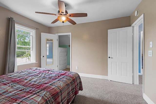 731 S Michigan St, De Pere, WI 54115 - carpeted bedroom featuring baseboards and a ceiling fan