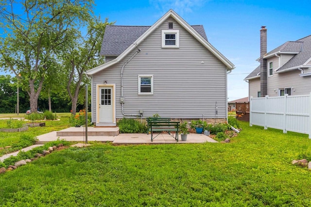 731 S Michigan St, De Pere, WI 54115 - rear view of property with a patio and a shingled roof