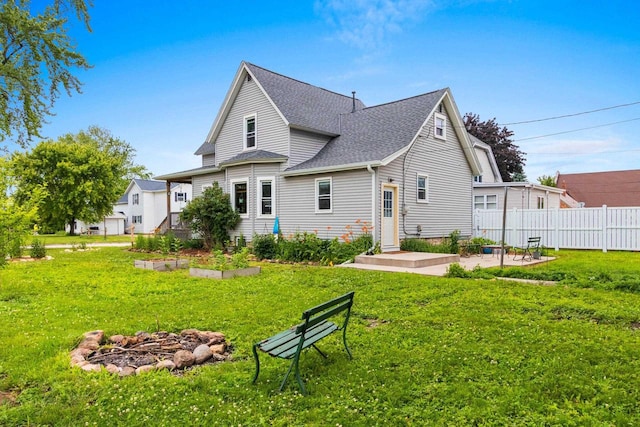 731 S Michigan St, De Pere, WI 54115 - back of house with roof with shingles and a patio