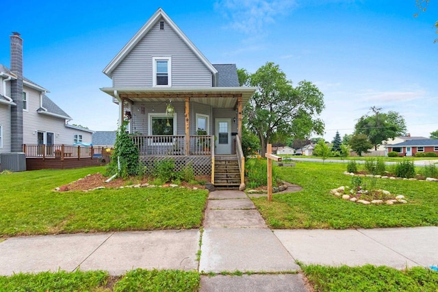 731 S Michigan St, De Pere, WI 54115 - bungalow-style house with a porch and a front yard