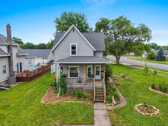 731 S Michigan St, De Pere, WI 54115 - view of front of house with a shingled roof, a porch, a front yard, and stairs