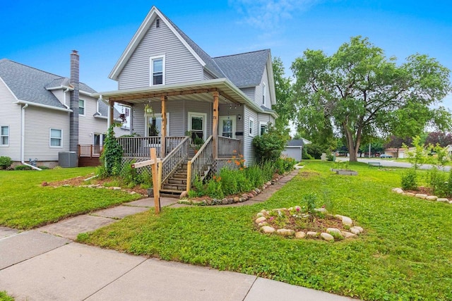 731 S Michigan St, De Pere, WI 54115 - view of front facade featuring covered porch, a front yard, and roof with shingles