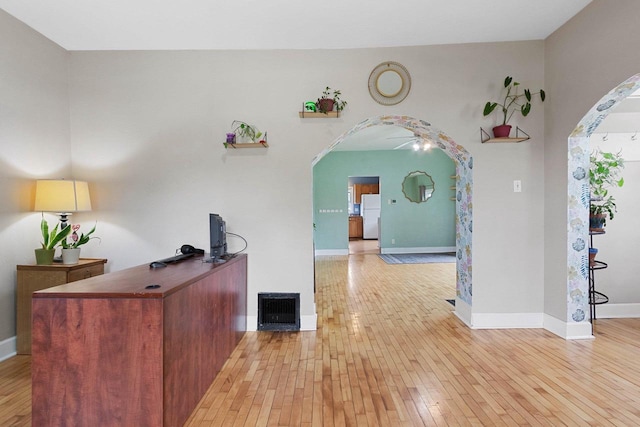 731 S Michigan St, De Pere, WI 54115 - home office with arched walkways and light wood finished floors