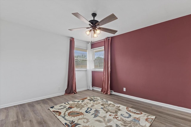 8122 W Potomac Ave, Milwaukee, WI 53218 - spare room with wood finished floors and a ceiling fan