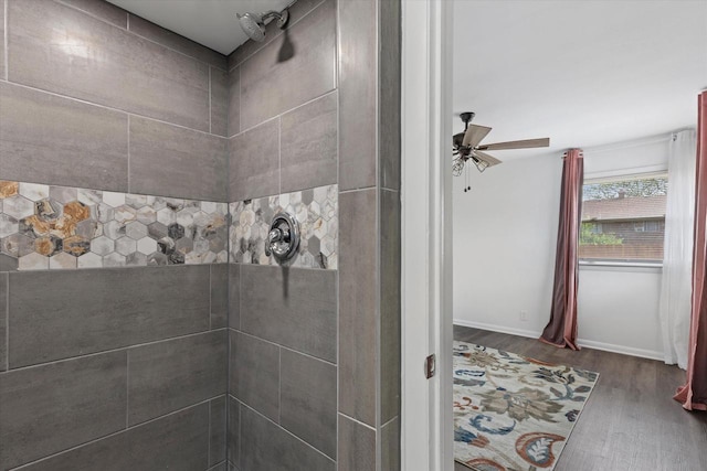 8122 W Potomac Ave, Milwaukee, WI 53218 - full bath featuring wood finished floors, tiled shower, and a ceiling fan