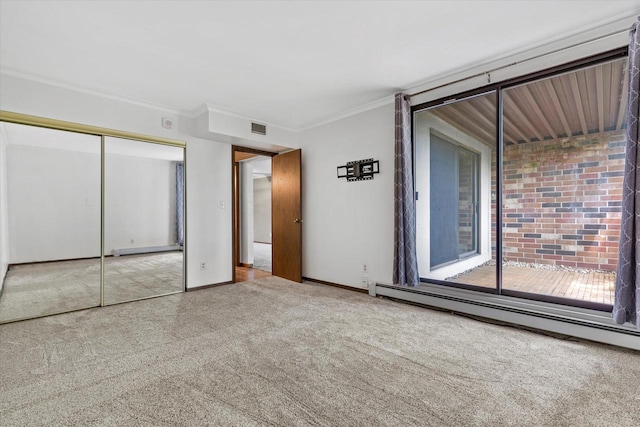 2300 W Good Hope Rd Unit 242, Glendale, WI 53209 - unfurnished bedroom featuring carpet floors, baseboard heating, ornamental molding, and a closet