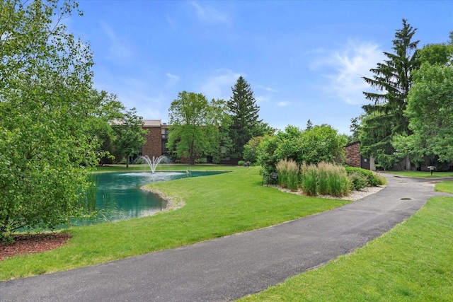 2300 W Good Hope Rd Unit 242, Glendale, WI 53209 - view of home's community featuring a lawn