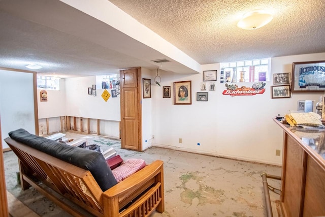 7414 5th Ave, Kenosha, WI 53143 - living area with a textured ceiling and light carpet