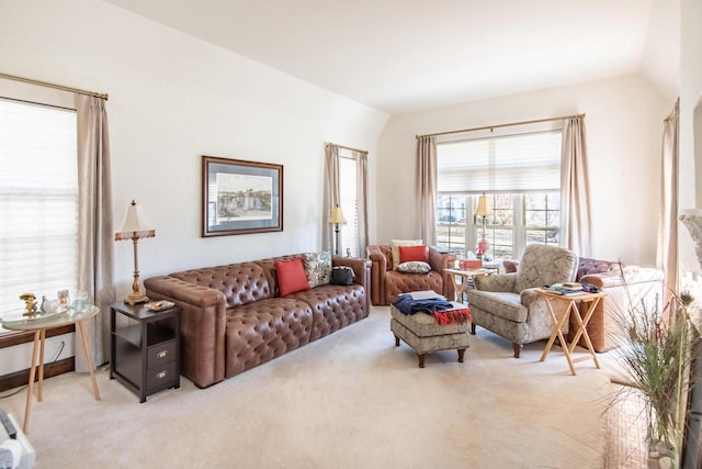 7414 5th Ave, Kenosha, WI 53143 - living room featuring light carpet and vaulted ceiling