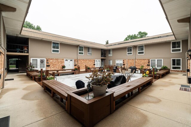 11957 N Appleton Ave Unit 19, Milwaukee, WI 53224 - view of patio / terrace with outdoor dining space and grilling area