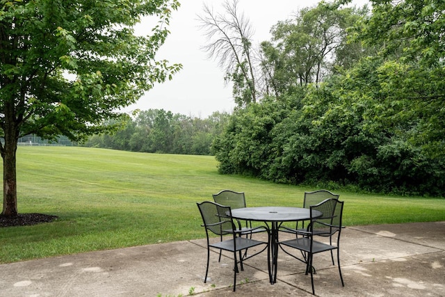 11957 N Appleton Ave Unit 19, Milwaukee, WI 53224 - view of patio / terrace with outdoor dining space