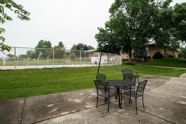 11957 N Appleton Ave Unit 19, Milwaukee, WI 53224 - view of patio / terrace featuring outdoor dining area