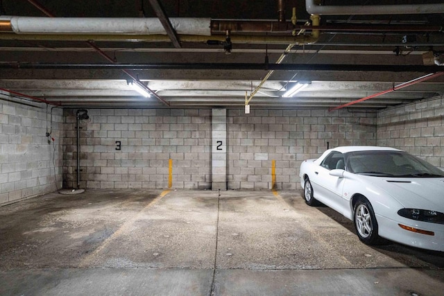 11957 N Appleton Ave Unit 19, Milwaukee, WI 53224 - parking garage featuring concrete block wall