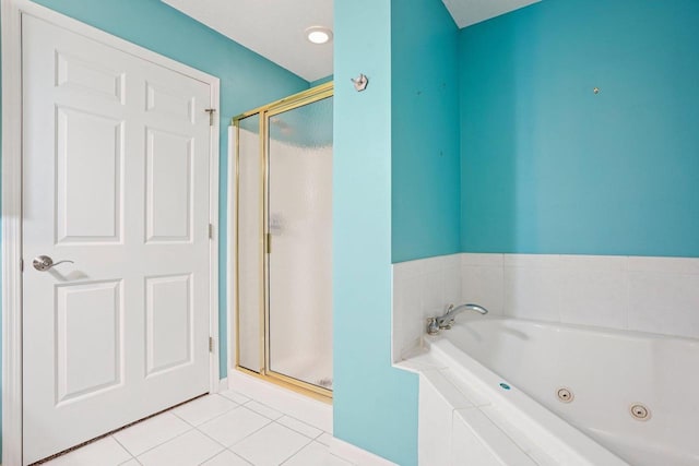 5682 Steeplechase Dr, Waunakee, WI 53597 - full bathroom with a stall shower, a whirlpool tub, and tile patterned flooring