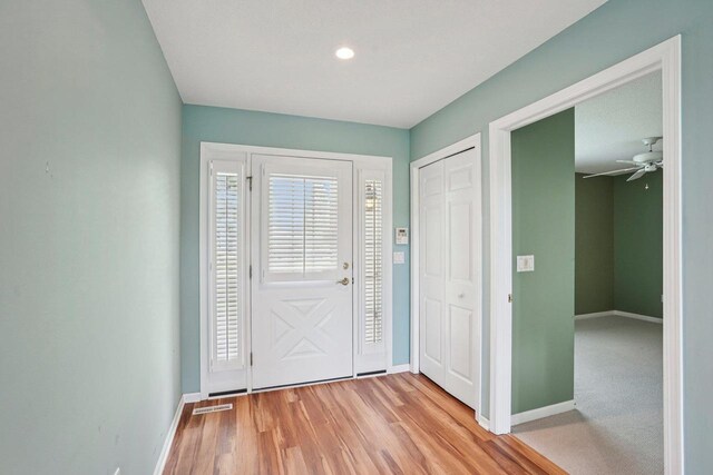 5682 Steeplechase Dr, Waunakee, WI 53597 - foyer featuring light wood finished floors, a ceiling fan, and recessed lighting
