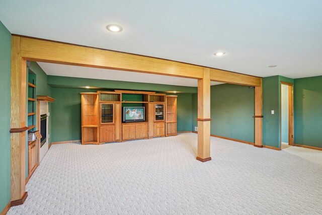 5682 Steeplechase Dr, Waunakee, WI 53597 - finished below grade area featuring carpet flooring, a fireplace, and recessed lighting