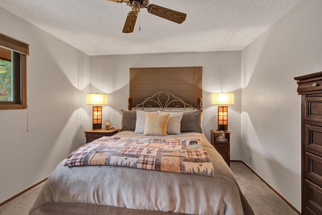 1167 Tee Trl, Nekoosa, WI 54457 - bedroom featuring carpet, a textured ceiling, and a ceiling fan