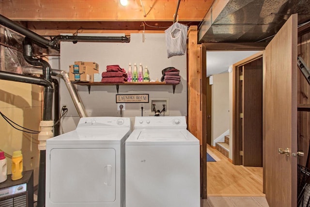 1167 Tee Trl, Nekoosa, WI 54457 - laundry area with separate washer and dryer and light wood finished floors
