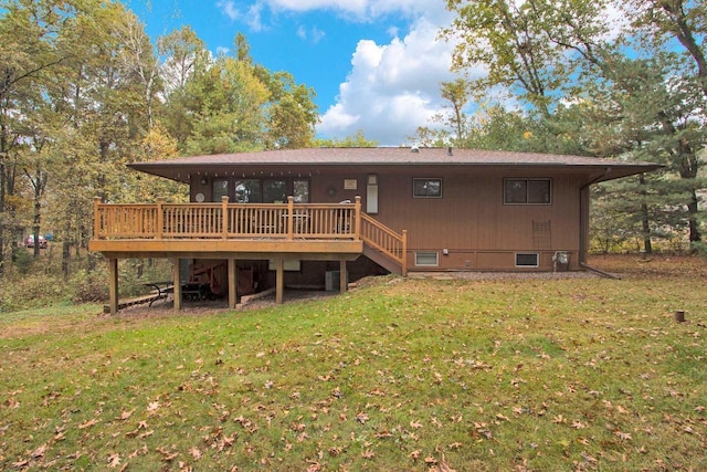 1167 Tee Trl, Nekoosa, WI 54457 - back of house with a deck, a yard, and stairway