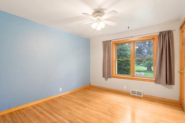 W262S3159 View Dr, Waukesha, WI 53189 - spare room featuring wood finished floors and a ceiling fan
