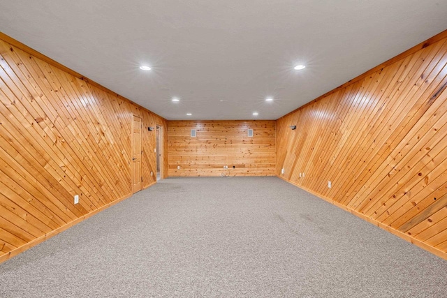 N3520 Range Ct, Freedom, WI 54913 - carpeted empty room with wood walls and recessed lighting