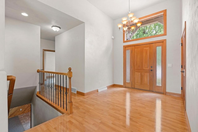 N3520 Range Ct, Freedom, WI 54913 - entrance foyer featuring a chandelier, wood finished floors, and a high ceiling
