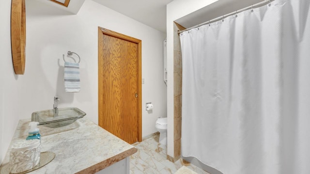 3515 Willow Cir, Sheboygan, WI 53083 - bathroom featuring vanity, marble finish floors, and a shower with shower curtain