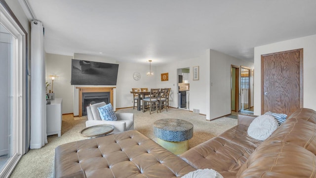 3515 Willow Cir, Sheboygan, WI 53083 - carpeted living room with a fireplace and baseboards