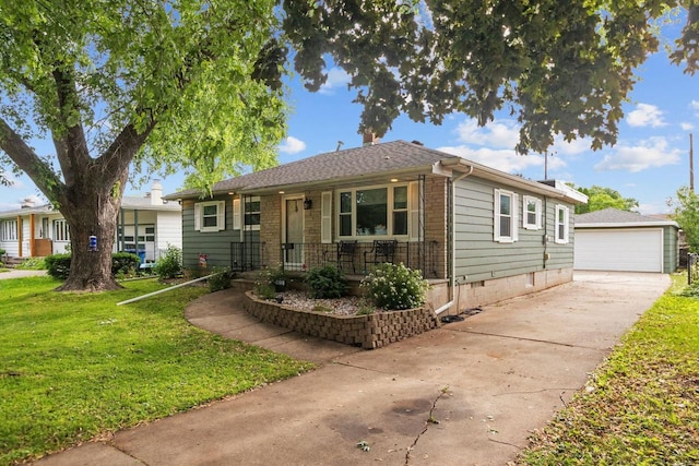 1012 Grove St, Oshkosh, WI 54901 - view of front of house featuring covered porch, an outdoor structure, a front yard, and a detached garage