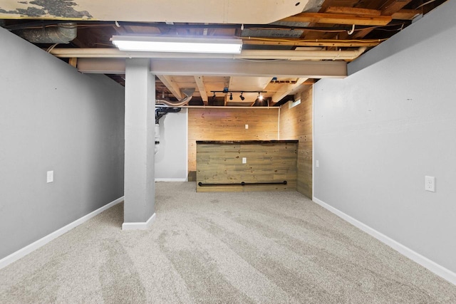 1012 Grove St, Oshkosh, WI 54901 - unfinished basement with carpet flooring and baseboards