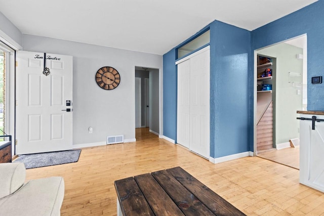1012 Grove St, Oshkosh, WI 54901 - entryway with wood finished floors and baseboards