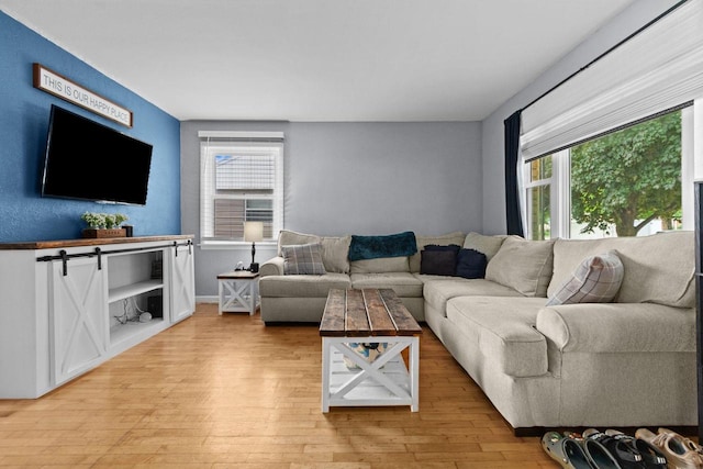 1012 Grove St, Oshkosh, WI 54901 - living room featuring light wood-style floors
