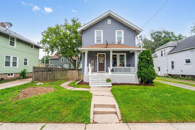 308 Van St, Neenah, WI 54956 - american foursquare style home with a porch and cooling unit