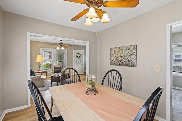 308 Van St, Neenah, WI 54956 - dining room featuring a ceiling fan and light wood-style flooring