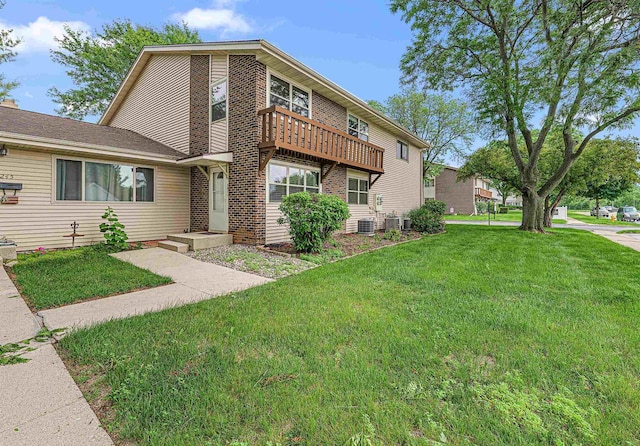 241 Bayberry Ln, Fond Du Lac, WI 54935 - view of front of property with a front yard and brick siding