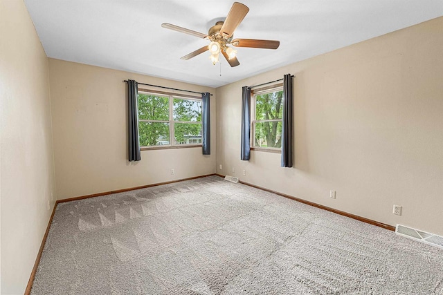 241 Bayberry Ln, Fond Du Lac, WI 54935 - spare room featuring a ceiling fan and carpet